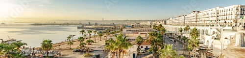 Fotografía Fishery Port and the urban sea Station, bay of water, the Martyr's Memorial, Zighout Youcef Boulevard and Angkor road with white buildings