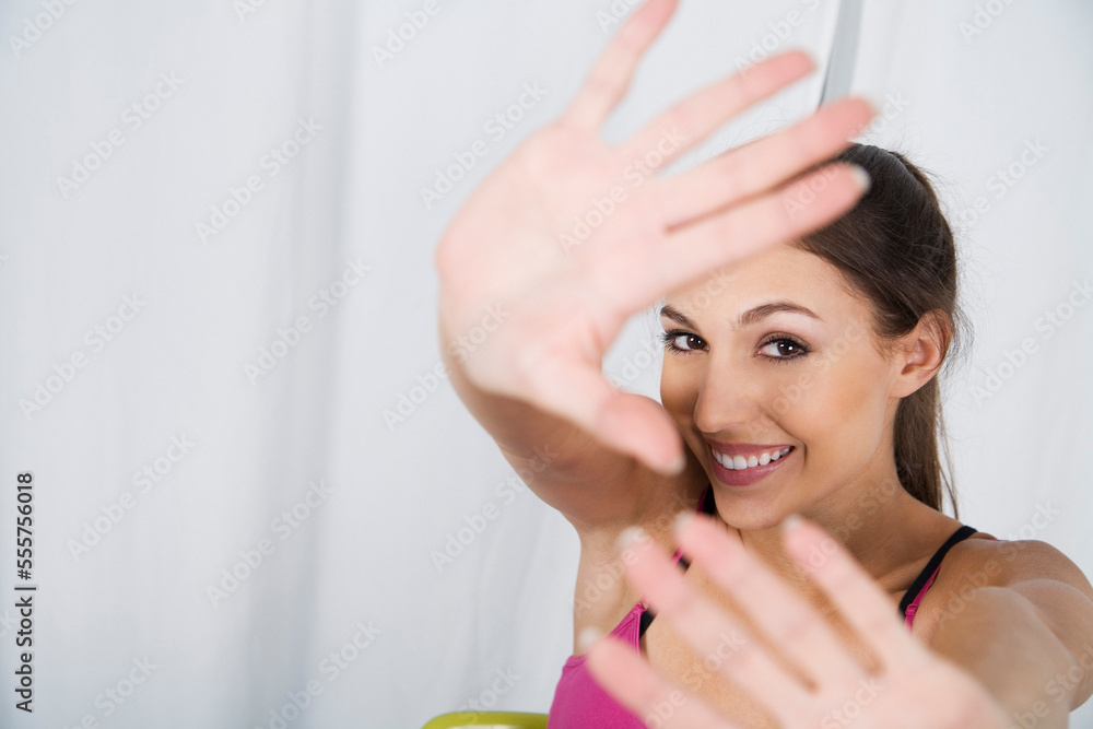 Portrait of Woman Covering Face