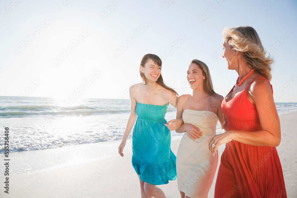Group of Women Walking on Beach, Florida, USA Group of Women Walking on Beach, Florida, USA