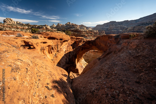 Cassidy Arch and Capitol Reef Formations In the Distance