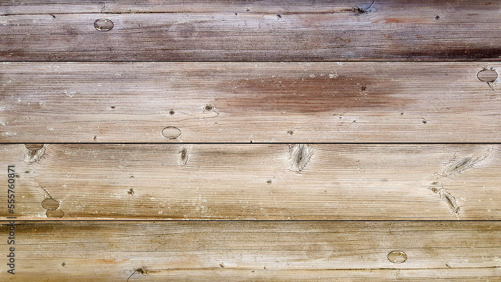 Fototapeta premium Top view of brown background wooden planks board texture.