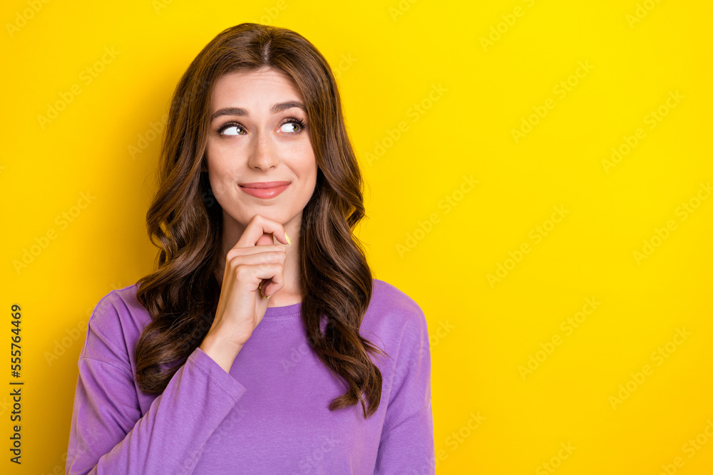 Photo of young looking curious empty space lady touch chin minded intelligent person proposition language courses isolated on yellow color background Photo of young looking curious empty space lady touch chin minded intelligent person proposition language courses isolated on yellow color background
