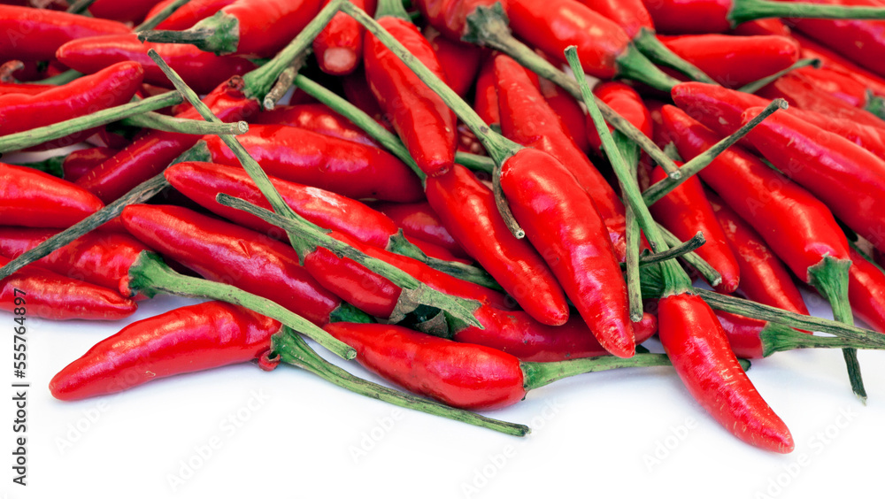 Stack of Brazilian Red Pepper on white background. Space for text