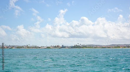 A beautiful coastal view on Aruba island from Caribbean sea. Space for text. 