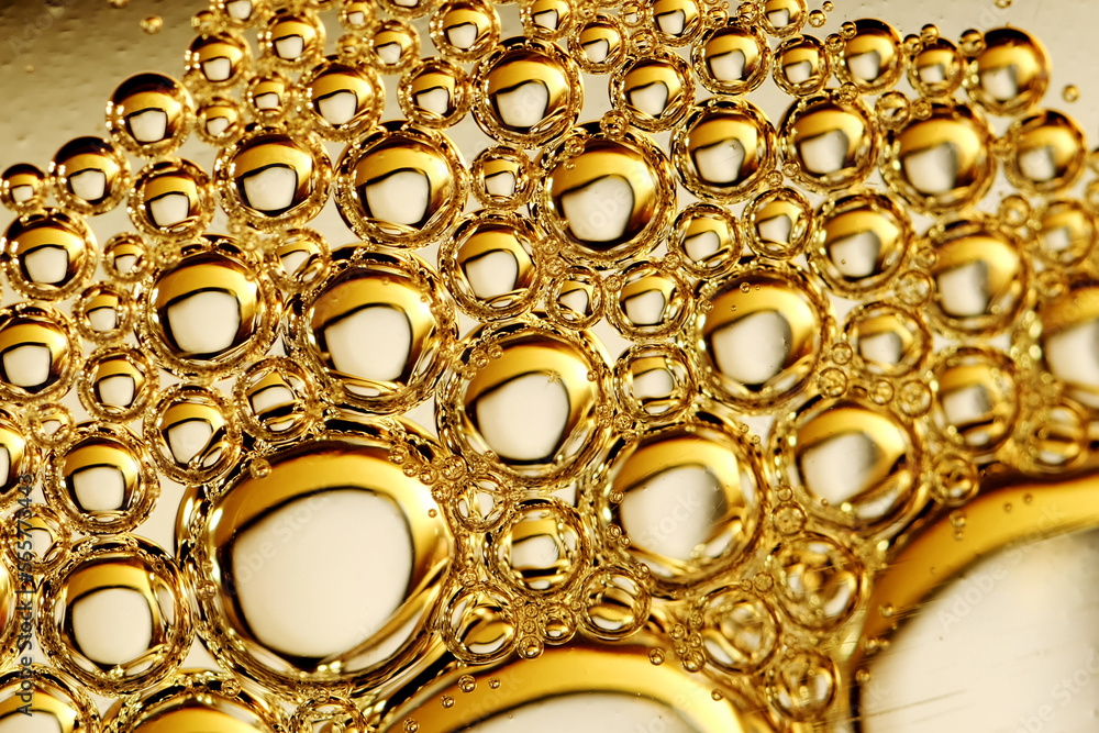 Macro shot of carbonated drink bubbles as background Macro shot of carbonated drink bubbles as background
