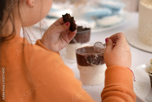 Картината върху платно cute girl eating dessert