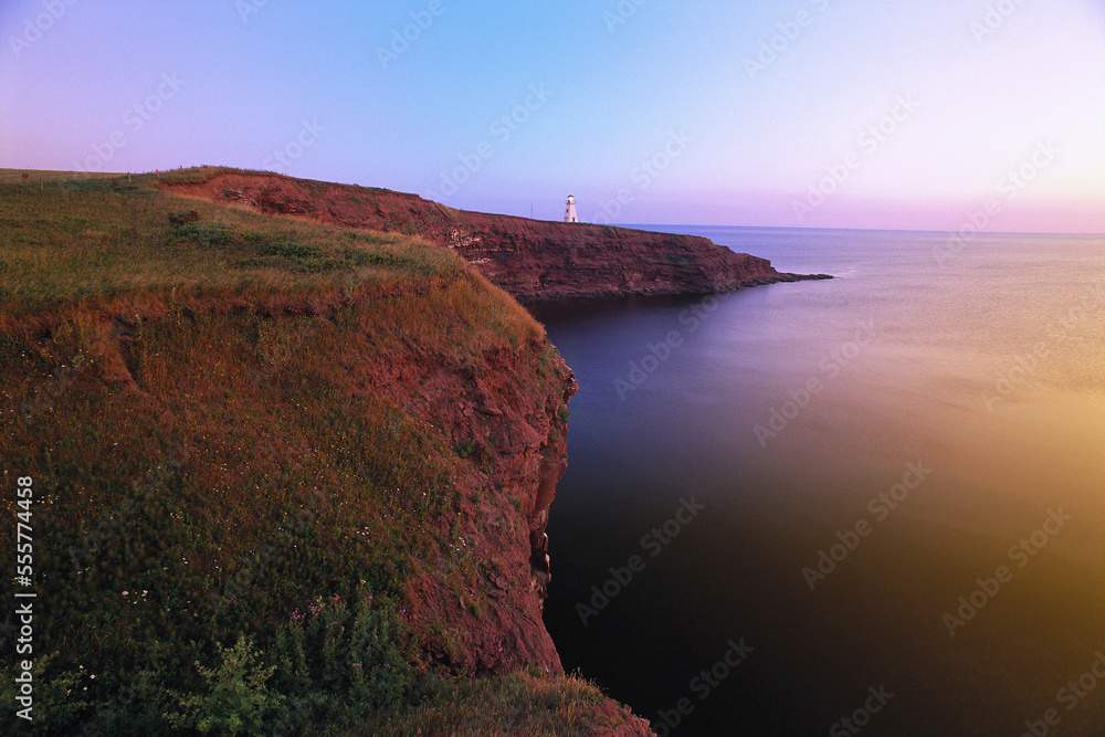 Cape Tryon Lighthouse and Gulf Of St. Lawrence at Sunrise, Cape Tryon, P.E.I., Canada Cape Tryon Lighthouse and Gulf Of St. Lawrence at Sunrise, Cape Tryon, P.E.I., Canada