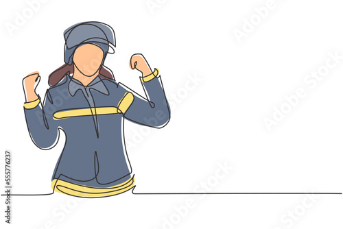 Single one line drawing female firefighter with celebrate gesture, uniform and wearing helmet prepare to put out the fire that burned building. Continuous line draw design graphic vector illustration
