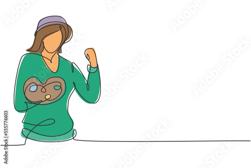 Single continuous line drawing female painter with celebrate gesture using painting tools such as brushes, canvas, and watercolors in producing art. One line draw graphic design vector illustration