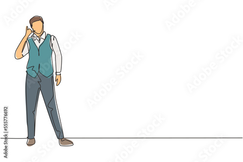 Single one line drawing steward stands in a uniform with call me gesture prepare at airport with the crew flying to their destination. Modern continuous line draw design graphic vector illustration