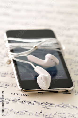 Earbuds, iPod and Sheet Music