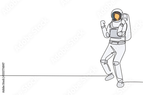 Single one line drawing female astronaut stands with celebrate gesture wearing space suit exploring earth, moon, other planets in the universe. Continuous line draw design graphic vector illustration