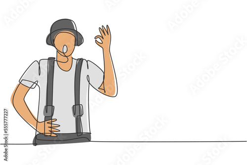 Single one line drawing of mime artist with gesture okay and white face make-up puts on a silent motion comedy show at circus arena. Modern continuous line draw design graphic vector illustration