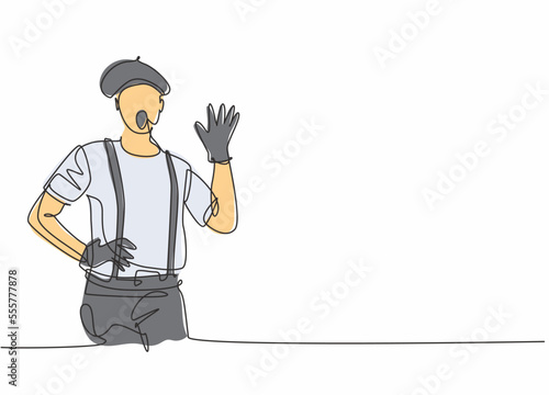 Continuous one line drawing of young male mime artist making hand gesture to entertain the audience. Professional job profession minimalist concept. Single line draw design vector graphic illustration