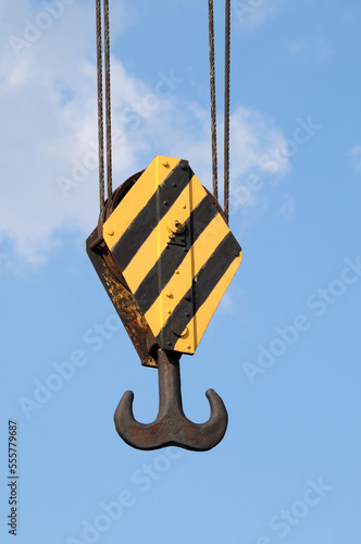 Hook and pulley against blue sky, Berlin, Germany photo