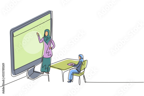 Single one line drawing Arabian female teacher standing in front of monitor screen holding book and teaching hijab female students sitting on benches around desk. Design graphic vector illustration