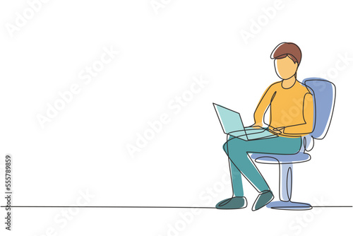 Single one line drawing young guy with laptop sitting on the chair. Freelance, distance learning, online courses, and studying concept. Modern continuous line draw design graphic vector illustration