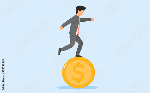CONCEPT OF FINANCIAL UNSTABILTY. A BUSINESSMAN STANDING ON UNSTABLE COIN. CONCEPT OF UNCERTAINTY INVESTMENT