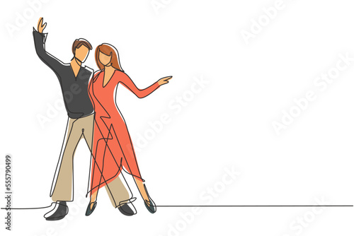 Single one line drawing man and woman professional dancer couple dancing tango, waltz dances on dancing contest dancefloor. Night party. Modern continuous line draw design graphic vector illustration