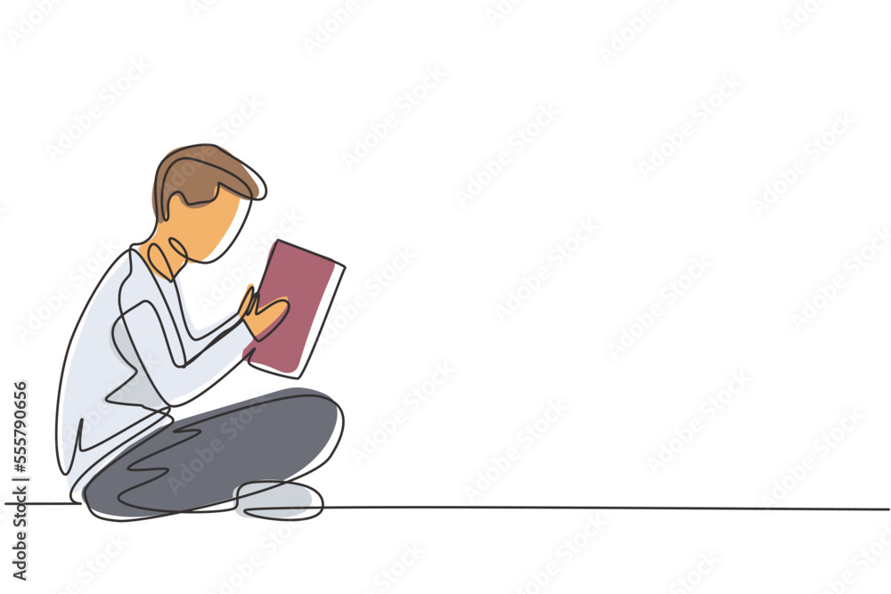 Continuous one line drawing young male reading, learning and sitting on the floor. Study in library. Intelligent student, education concept, fair. Single line draw design vector graphic illustration