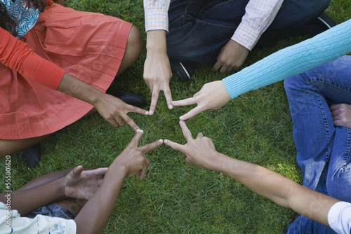 Group of Teens Making a Star photo