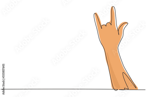 Single continuous line drawing rock on gesture symbol. Heavy metal or resistance hand gesture. Nonverbal signs or symbols. Hand variation shape. One line draw graphic design vector illustration
