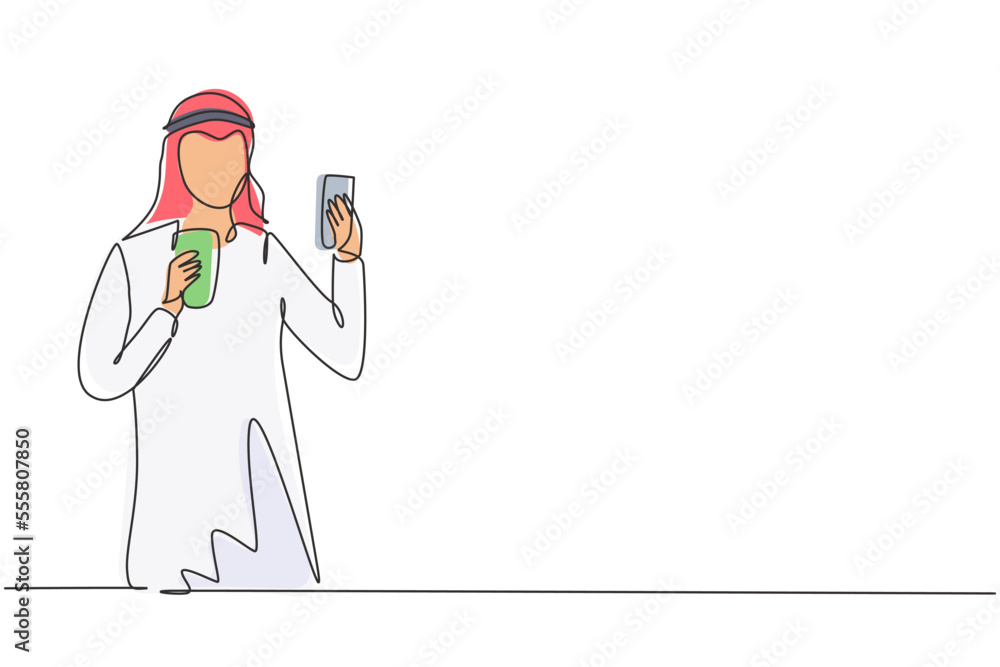 Single one line drawing smiling Arabian man looking at mobile phone and holding glass of orange juice while having breakfast at home. Modern continuous line draw design graphic vector illustration