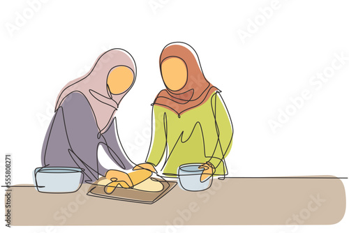 Continuous one line drawing two Arabian woman making cookie dough using rolling pin at cozy kitchen table. Making bakery and homemade pizza at home. Single line draw design vector graphic illustration