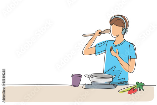 Continuous one line drawing handsome husband begin prepare family dinner singing like rock star with kitchenware and overjoyed music playlist. Single line draw design vector graphic illustration