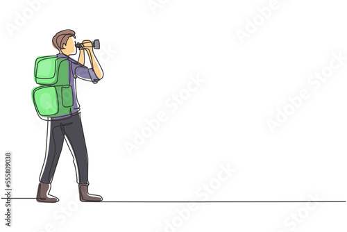 Continuous one line drawing male adventurer carrying backpack while looking through binoculars. Exploration of mountainous or hilly landscapes. Single line draw design vector graphic illustration