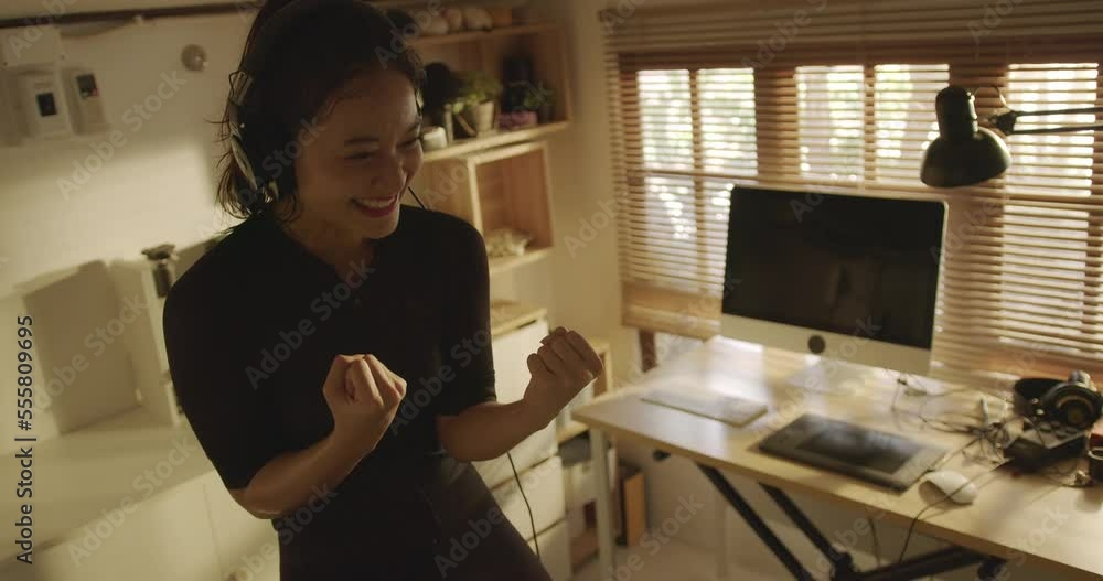 Female Asian cyclist, She is exercising at home. She rides a bike simulator.
Female Asian cyclist, She is exercising at home. She rides a bike simulator.