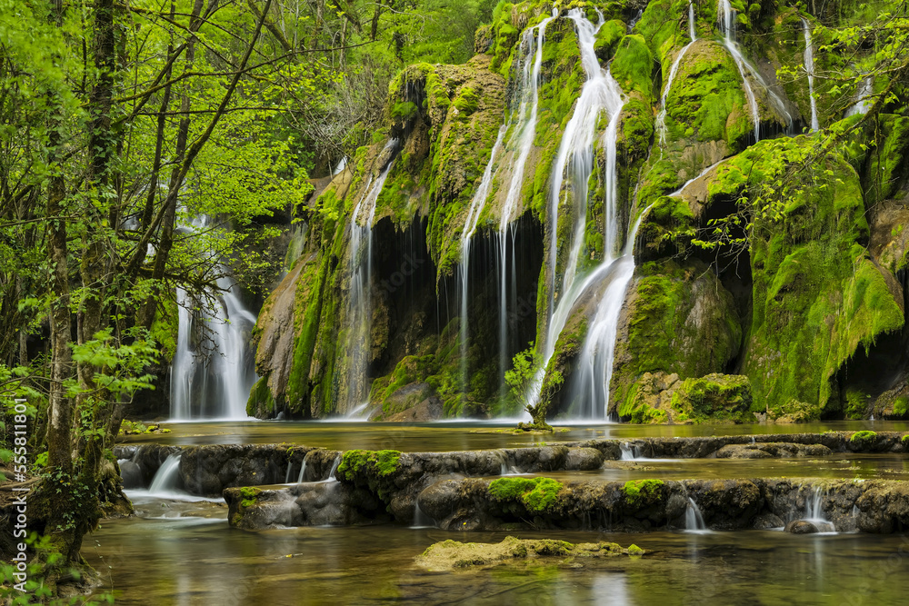 Waterfall cascading over green moss, Cascade des Tufs, Arbois, Jura, Jura Mountains, Franche-Comte, France Waterfall cascading over green moss, Cascade des Tufs, Arbois, Jura, Jura Mountains, Franche-Comte, France