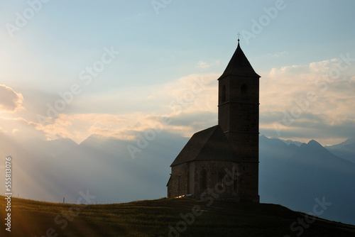 Backlit St Kathrein Church near Hafling, South Tyrol, Trentino-Alto Adige, Italy photo