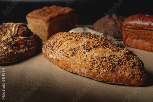 Multigrain sourdough bread with other craft bread in the background