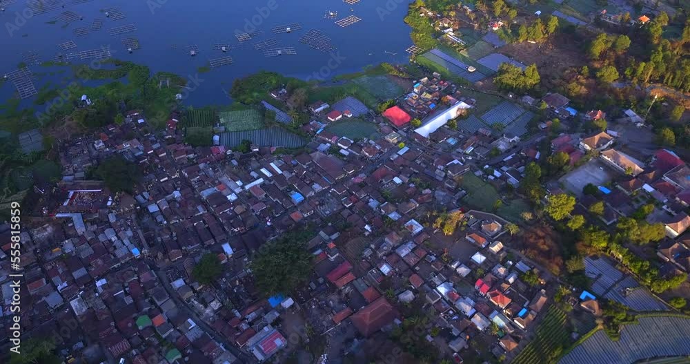 Aerial view at village near fish farming on the lake under Batur volcano ,Bali island,Indonesia
Aerial view at village near fish farming on the lake under Batur volcano ,Bali island,Indonesia