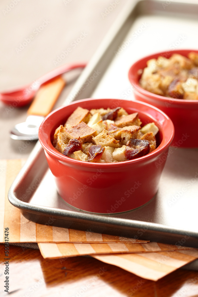 Child Size Serving of Bread Pudding on Baking Tray, Studio Shot Child Size Serving of Bread Pudding on Baking Tray, Studio Shot