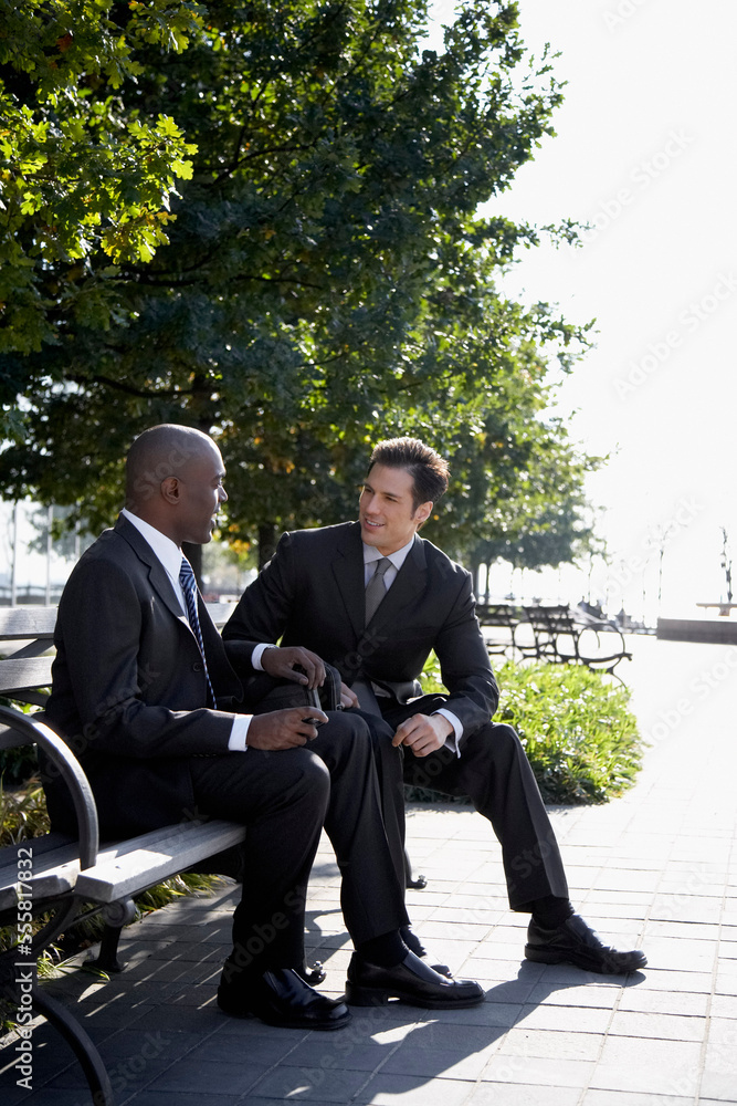 © Designpics - Businessmen Talking Outdoors © Designpics - Businessmen Talking Outdoors