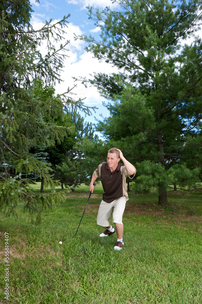 Golfer Looking for Ball in Rough, Burlington, Ontario, Canada Golfer Looking for Ball in Rough, Burlington, Ontario, Canada