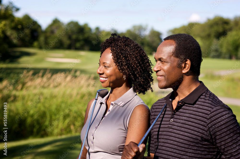 Portrait of Couple Golfing, Burlington, Ontario, Canada Portrait of Couple Golfing, Burlington, Ontario, Canada