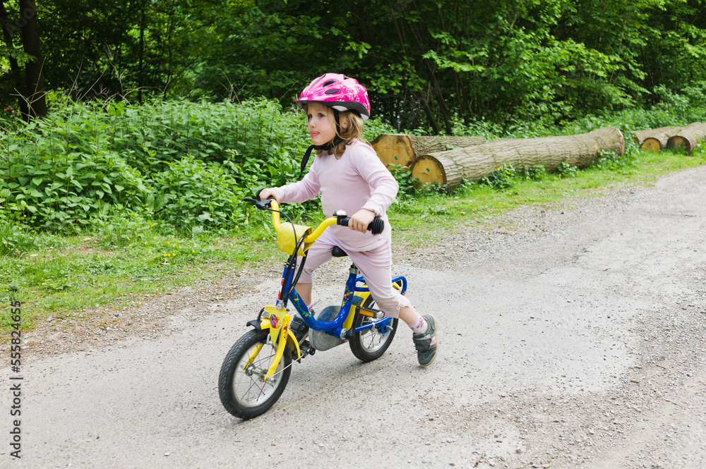 Girl on Riding a Bicycle, Germany