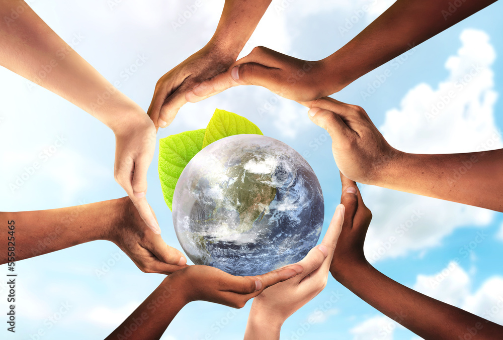 Conceptual symbol of multiracial human hands surrounding the Earth globe. Unity, world peace