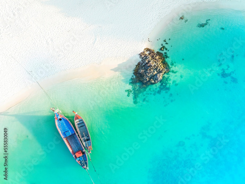 Aerial view with local boat on the beach as a background. Beautiful natural background at the summer time