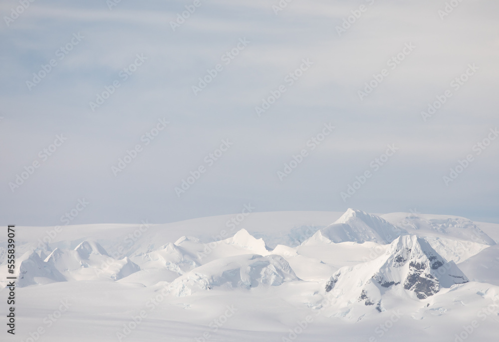 Grand landscape of mountains and snow in Antarctica.