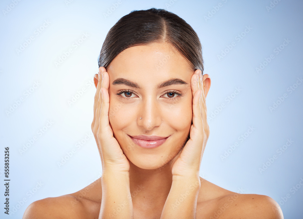 Portrait, skincare and beauty with a model woman in studio on a gray background for natural treatment. Face, wellness and luxury with an attractive young female posing to promote a skin care product Portrait, skincare and beauty with a model woman in studio on a gray background for natural treatment. Face, wellness and luxury with an attractive young female posing to promote a skin care product