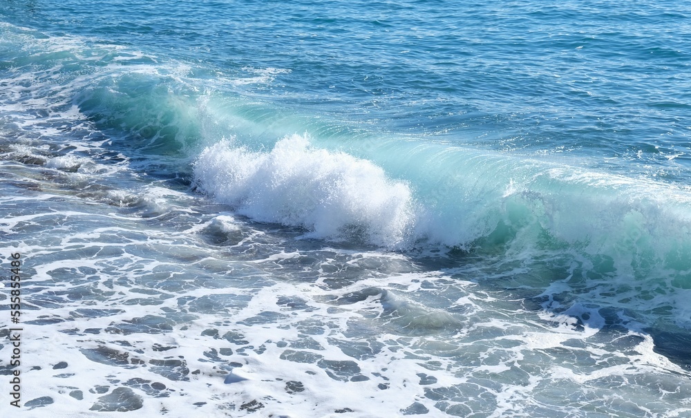 Wave hitting the beach in the sea. Wave hitting the beach in the sea.
