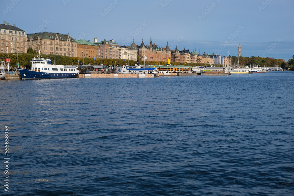 Boats parked at a waterfront in Stockholm, Sweden
