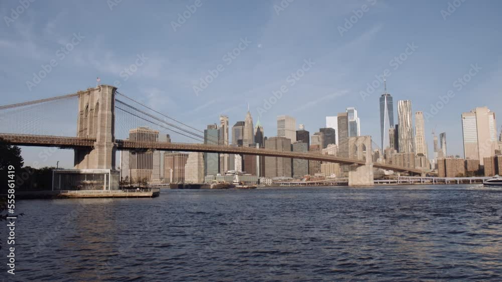 Brooklyn Bridge Spanning East River With Manhattan Skyscraper in background, USA, Wide Brooklyn Bridge Spanning East River With Manhattan Skyscraper in background, USA, Wide