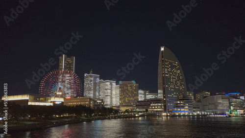 Night view of the city of Yokohama, in the background the Ferris wheel