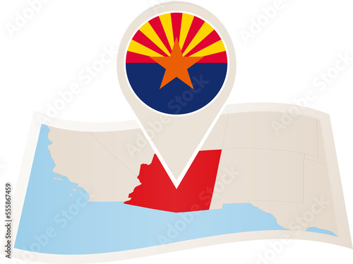 Folded paper map of Arizona U.S. State with flag pin of Arizona. photo