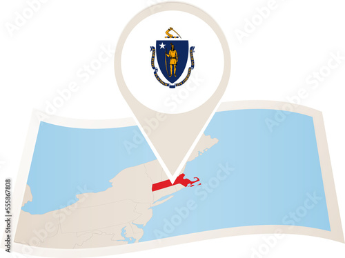 Folded paper map of Massachusetts U.S. State with flag pin of Massachusetts.